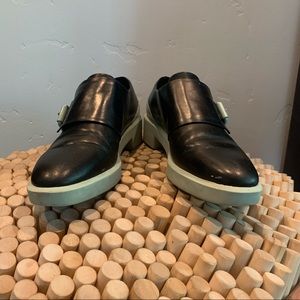 Rockabilly black and mint green buckled shoes.